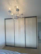 3 door sliding wardrobe with Sahara design in mussel with gun metal frames, fitted in Ingleby Barwick